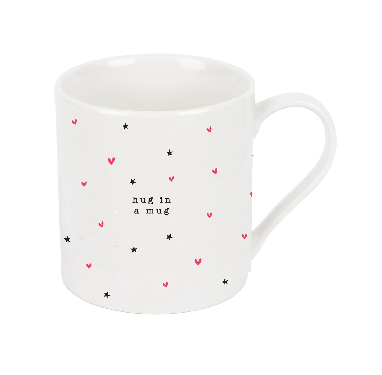 A white ceramic mug with a pattern of red hearts and stars and the text 'HUG IN A MUG' on it.