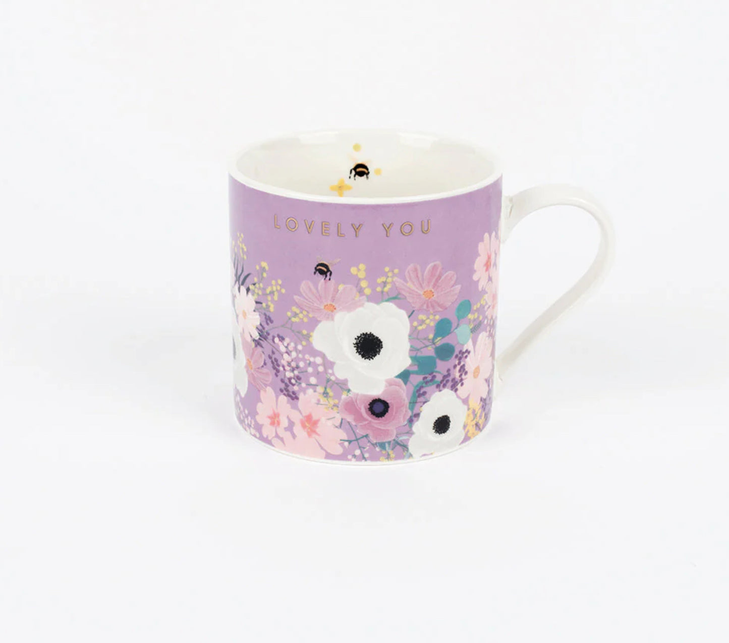A purple Bone China mug with floral patterns and the phrase 'Lovely You' on the side.