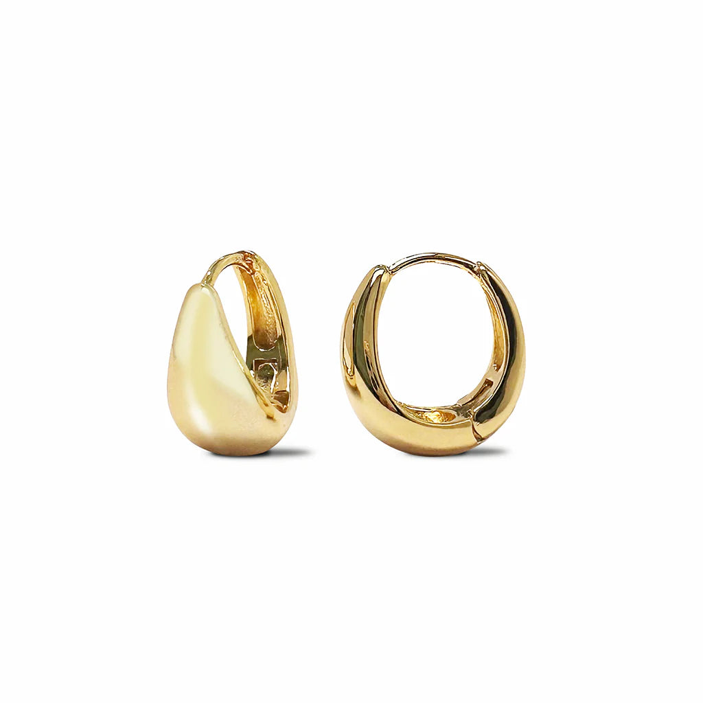 Huggie hoop earrings in Gold