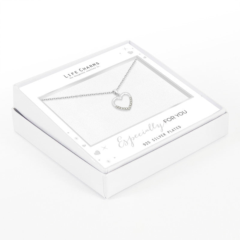 An adjustable silver necklace with a crystal encrusted open heart charm, presented in a white gift box with 'Life Charms' branding.