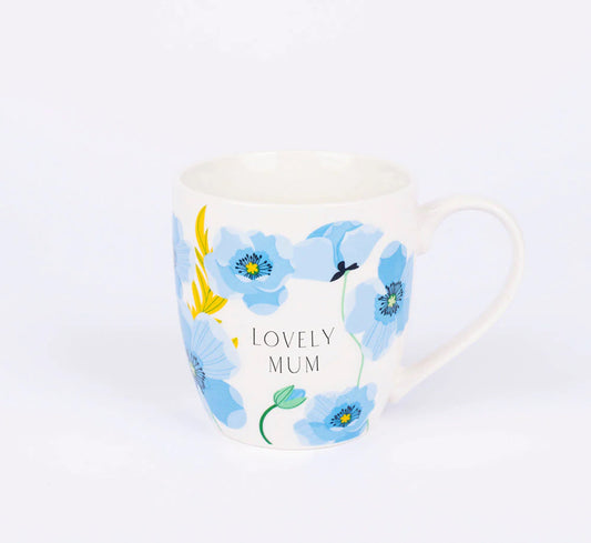A white bone china mug with blue floral patterns and the text 'LOVELY MUM' on the side.
