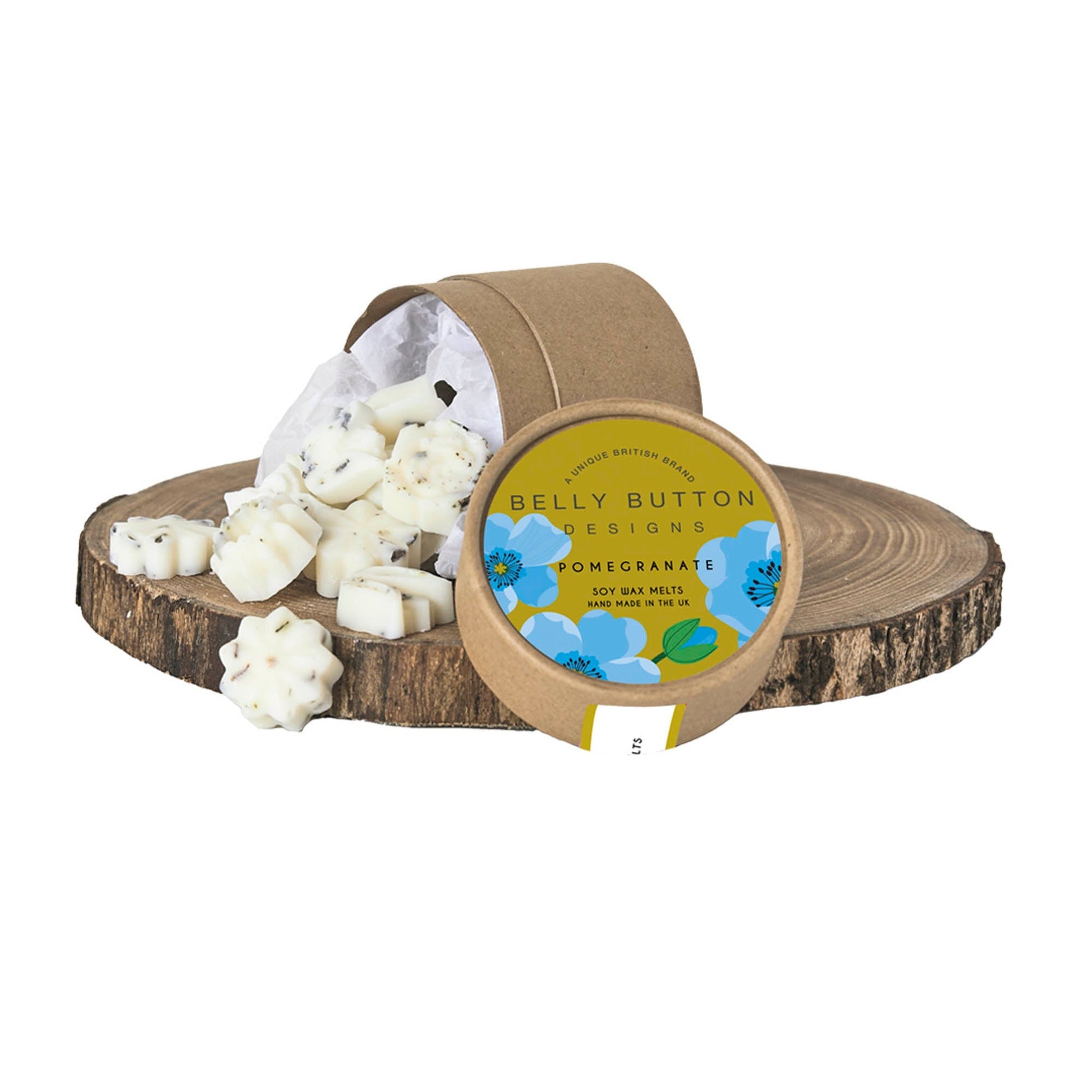 A collection of flower-shaped scented soy wax melts in white, with a small round container labeled 'Belly Button Designs' in the background, placed on a wooden slice.