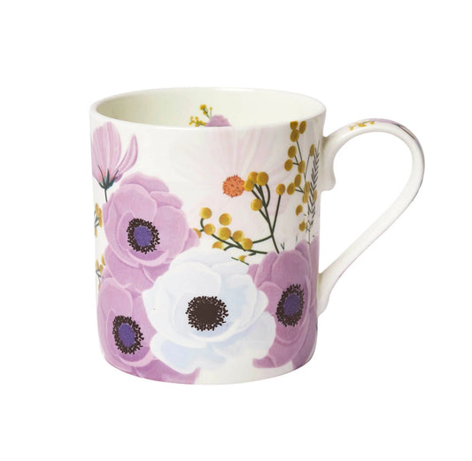 A bone china mug with a floral design, featuring pink and white flowers, presented against a white background.