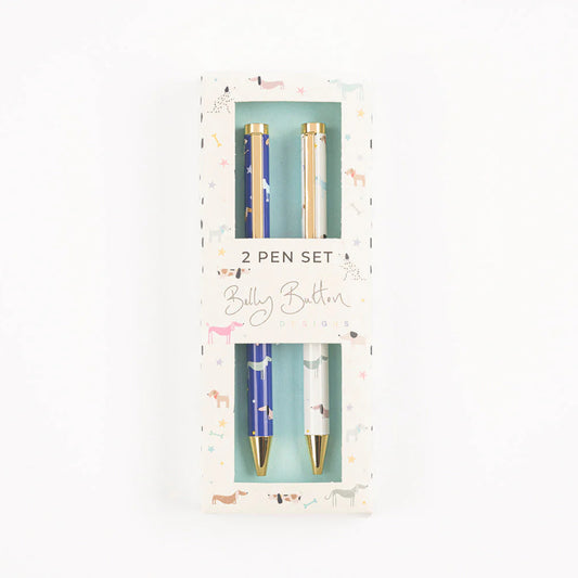 A set of two ballpoint pens with a blue and gold design, packaged in a gift box with a pattern of dogs and other animals.