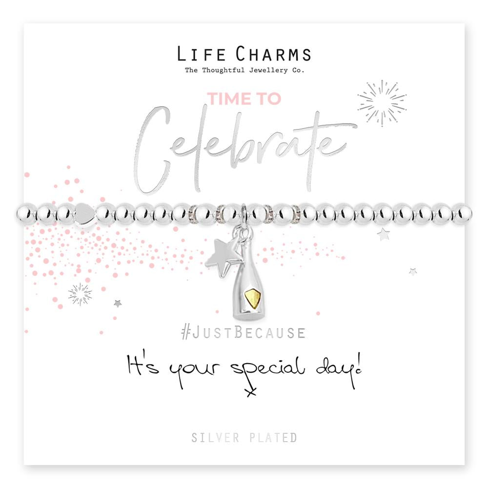 Silver bracelet with star and heart charm on a white background with 'Life Charms' branding.