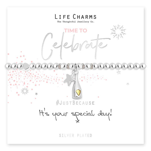 Silver bracelet with star and heart charm on a white background with 'Life Charms' branding.