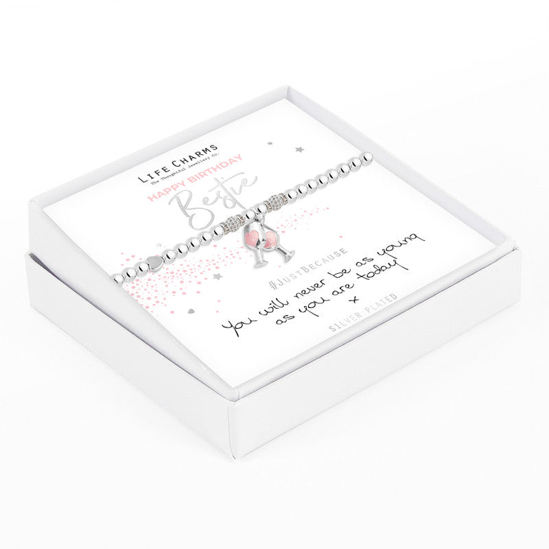 A silver-plated elastic bracelet with crystal beads and wine glass charms, presented in a white gift box with a written message.