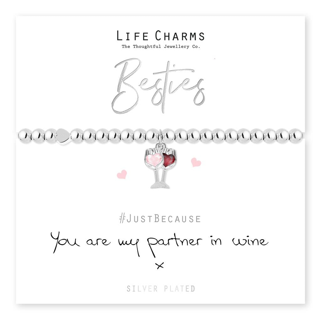 Silver bracelet with wine glass charm on a white background, featuring 'Life Charms' branding.