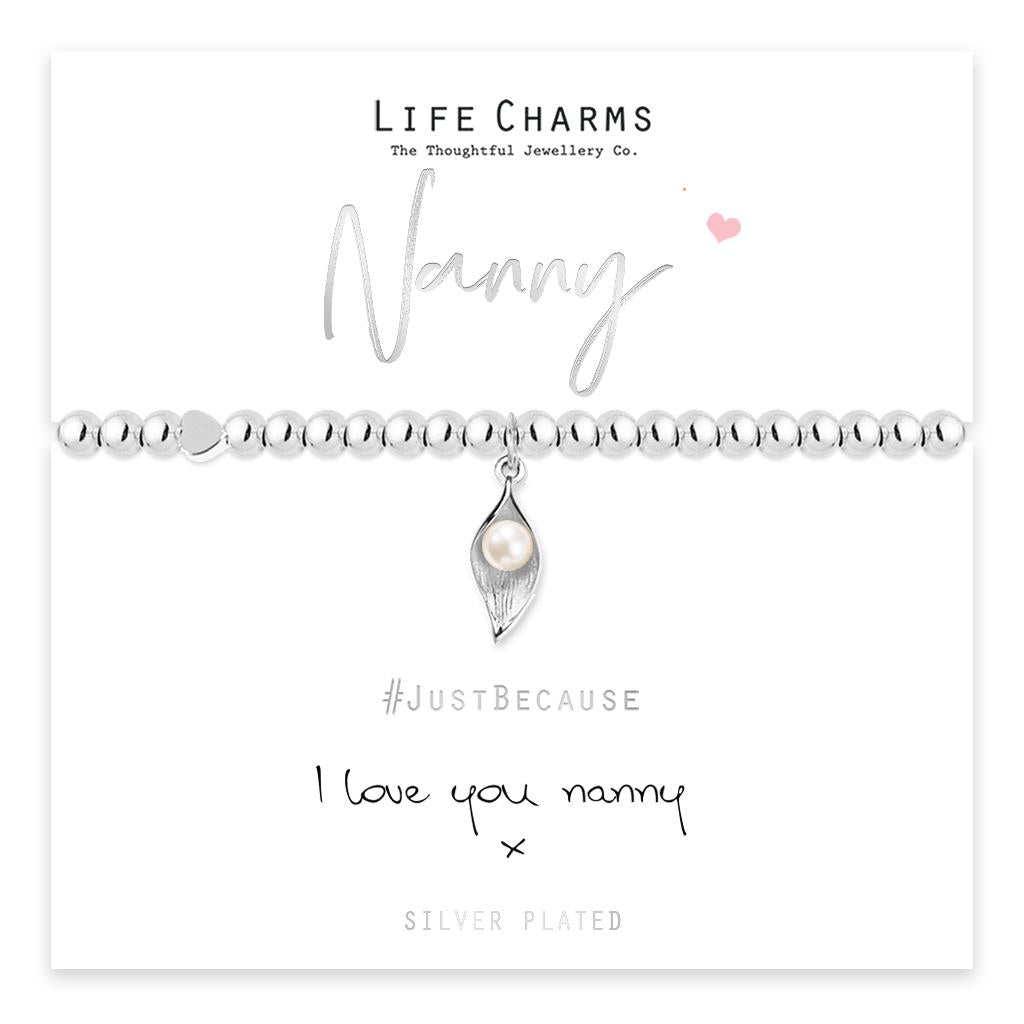 A silver-plated flower charm bracelet on a card with 'LIFE CHARMS Nanny' text and a 'Just Because I Love You Nanny' message. The bracelet is displayed on a white background.