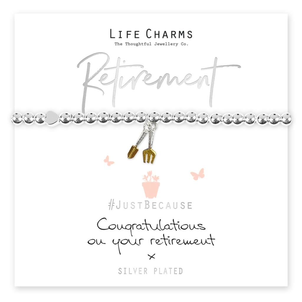 A silver-plated beaded bracelet with a gold garden spade charm, presented on a card that reads 'LIFE CHARMS Retirement' and 'Just Because Congratulations on your retirement'.
