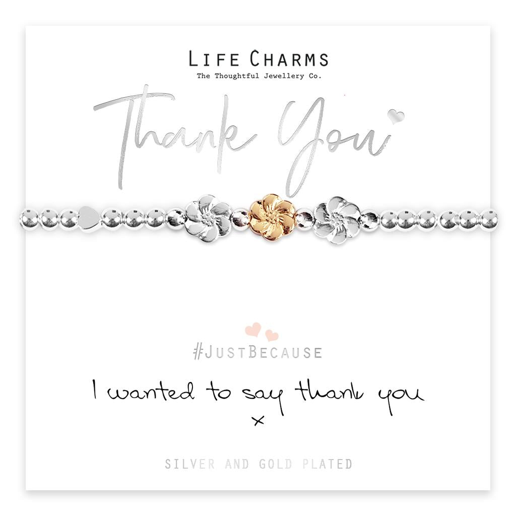A silver and rose gold plated bracelet with flower bead charms, presented on a card that reads 'Life Charms Thank You' and 'Just Because I Wanted to Say Thank You'.