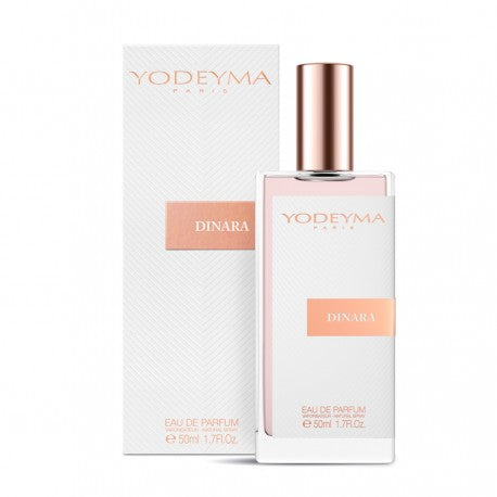A bottle of yodeyma Eau de parfum 50ml with its packaging, the fragrance name is Dinara indicated on the box. enchants with its powdery aura—like vintage face powder gently dusted across delicate florals. Soft notes of jasmine, rose, and ylang-ylang mingle with comforting tonka bean, before settling into a tender base of heliotrope, musk, and sweet rose and jasmine. Elegant and nostalgic, it carries the refined femininity of the Belle Époque. Smells like: Teint De Neige by Lorenzo Villoresi.