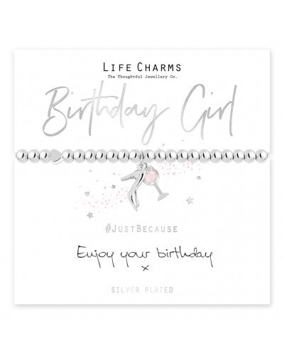 Silver plated bracelet with wine glass and heel charms on a card that reads 'Life Charms Birthday Girl' with a message to enjoy your birthday.
