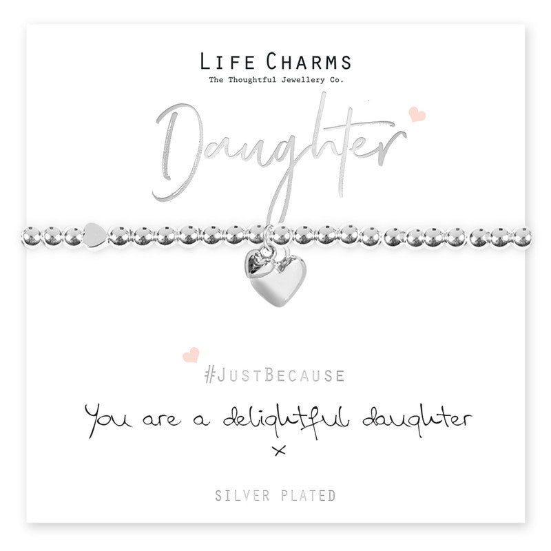 A silver-plated heart charm bracelet on a card with 'Daughter' written above it, and the brand 'Life Charms' below. The card has a message that reads '#JustBecause you are a delightful daughter', with the hashtag and the brand name.