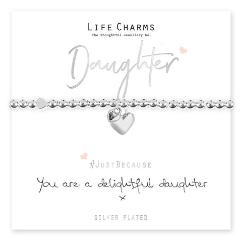 A silver-plated heart charm bracelet on a card with 'Daughter' written above it, and the brand 'Life Charms' below. The card has a message that reads '#JustBecause you are a delightful daughter', with the hashtag and the brand name.