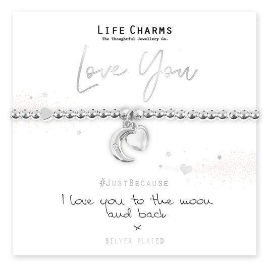 A silver plated bracelet with a puffed heart charm and a moon charm with a single cz stone, presented on a card with the text 'Love You' and 'I love you to the moon and back'.
