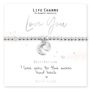 A silver plated bracelet with a puffed heart charm and a moon charm with a single cz stone, presented on a card with the text 'Love You' and 'I love you to the moon and back'.