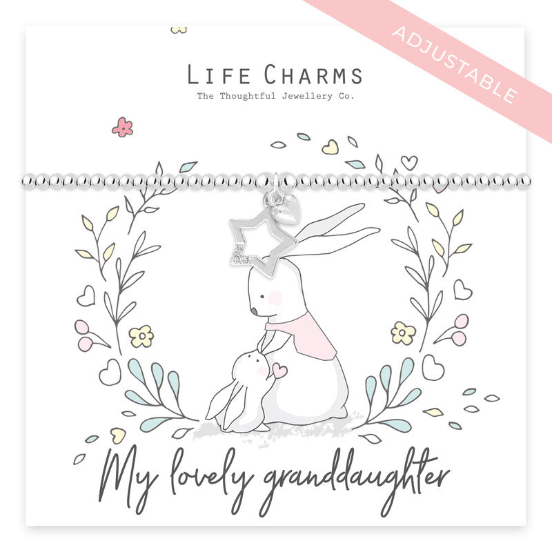 Illustration of a bracelet with a silver-plated bead, stars, and a charm of a rabbit and a bunny with the text 'My lovely granddaughter'.